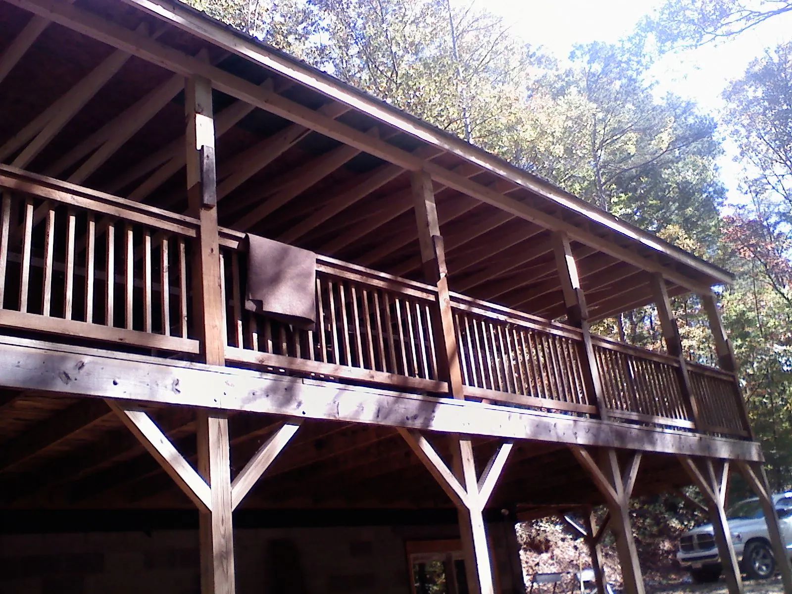 Timber framing under a new elevated porch and deck — Roof Leak Repair in Republic by Roofing Brothers